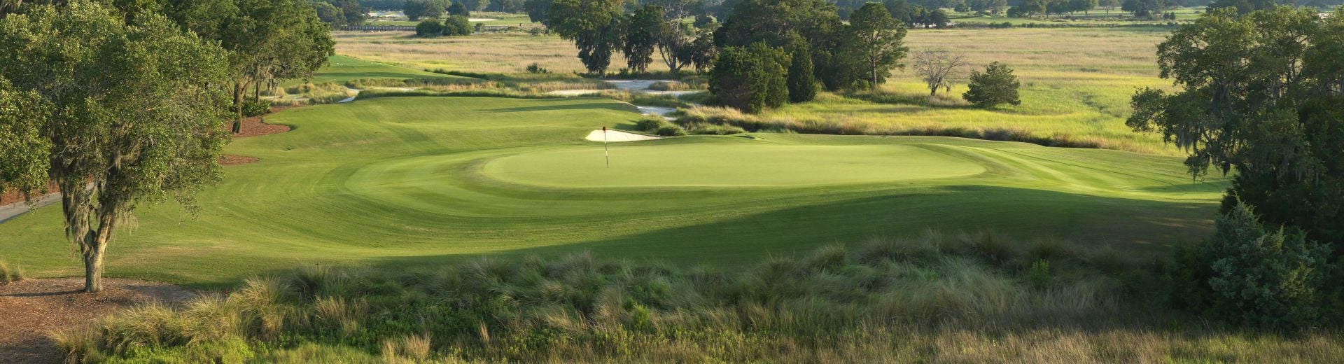An early morning photo of the one of the greens at the Seaside Course at Sea Island Club in Sea Island Georgia